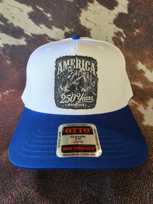 America 250 Rock Legends Leather Patch Hat | Royal & White OTTO 5-Panel Trucker